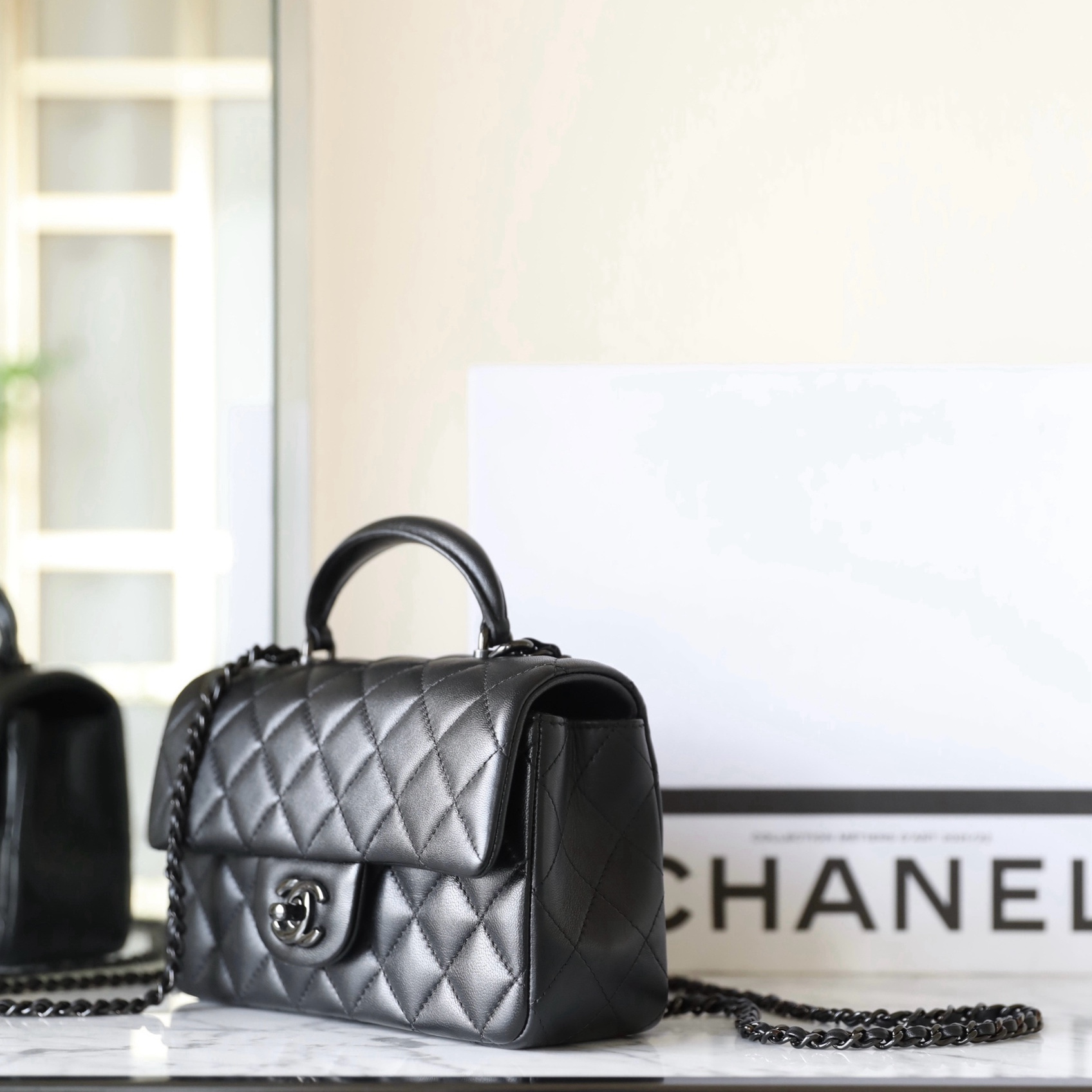 Chanel 24A CF series lambskin handle bag