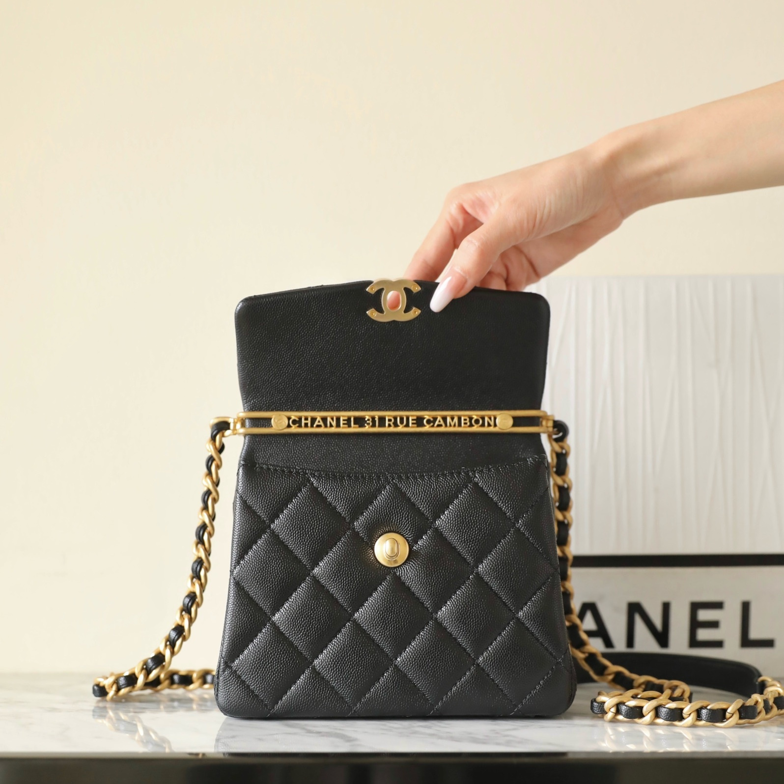 Chanel 24S braided chain top handle flap mini black caviar