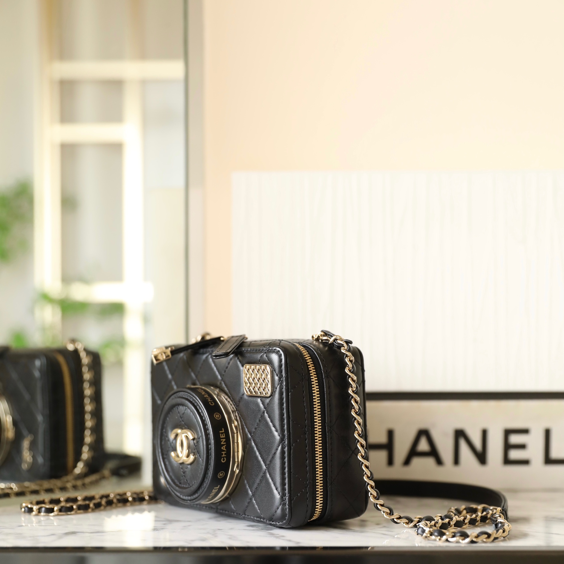 Chanel 24S limited edition camera bag black lambskin light gold hardware