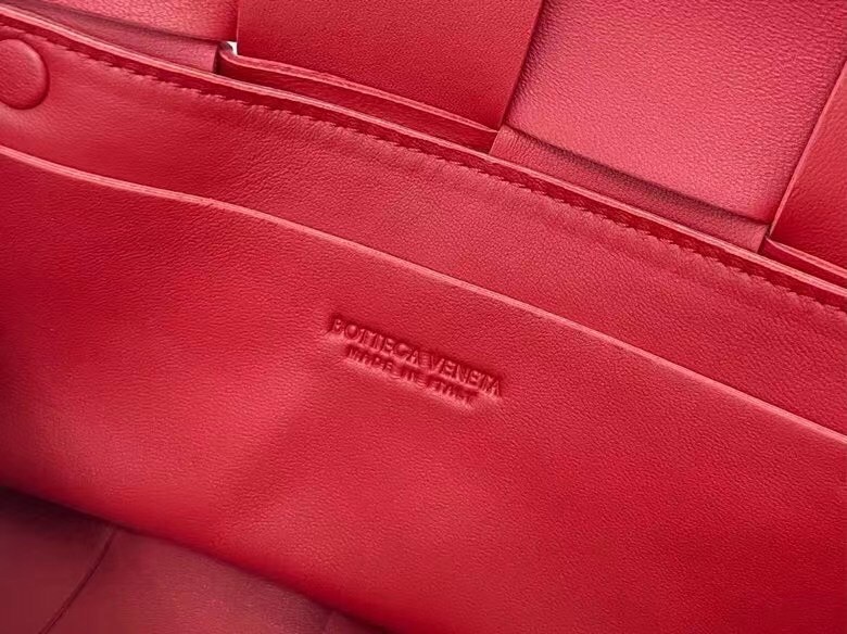 Bottega Veneta Cassette Belt Bag In Red Intrecciato Leather