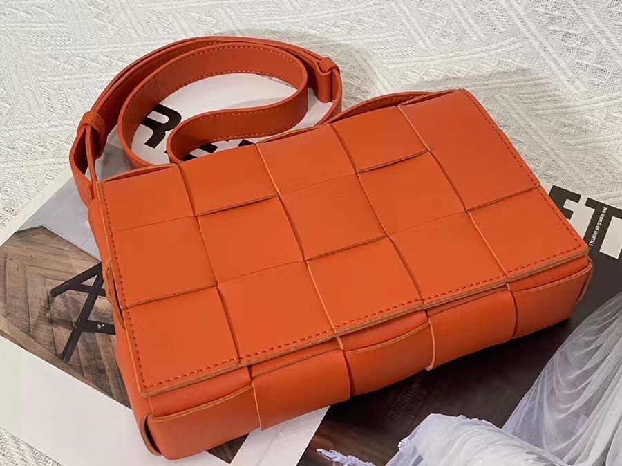 Bottega Veneta Cassett Bag In Orange Intrecciato Lambskin