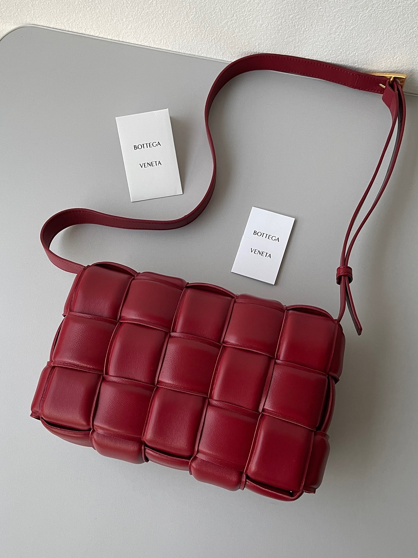 Bottega Veneta Padded Cassette Bag In Dard Red Lambskin