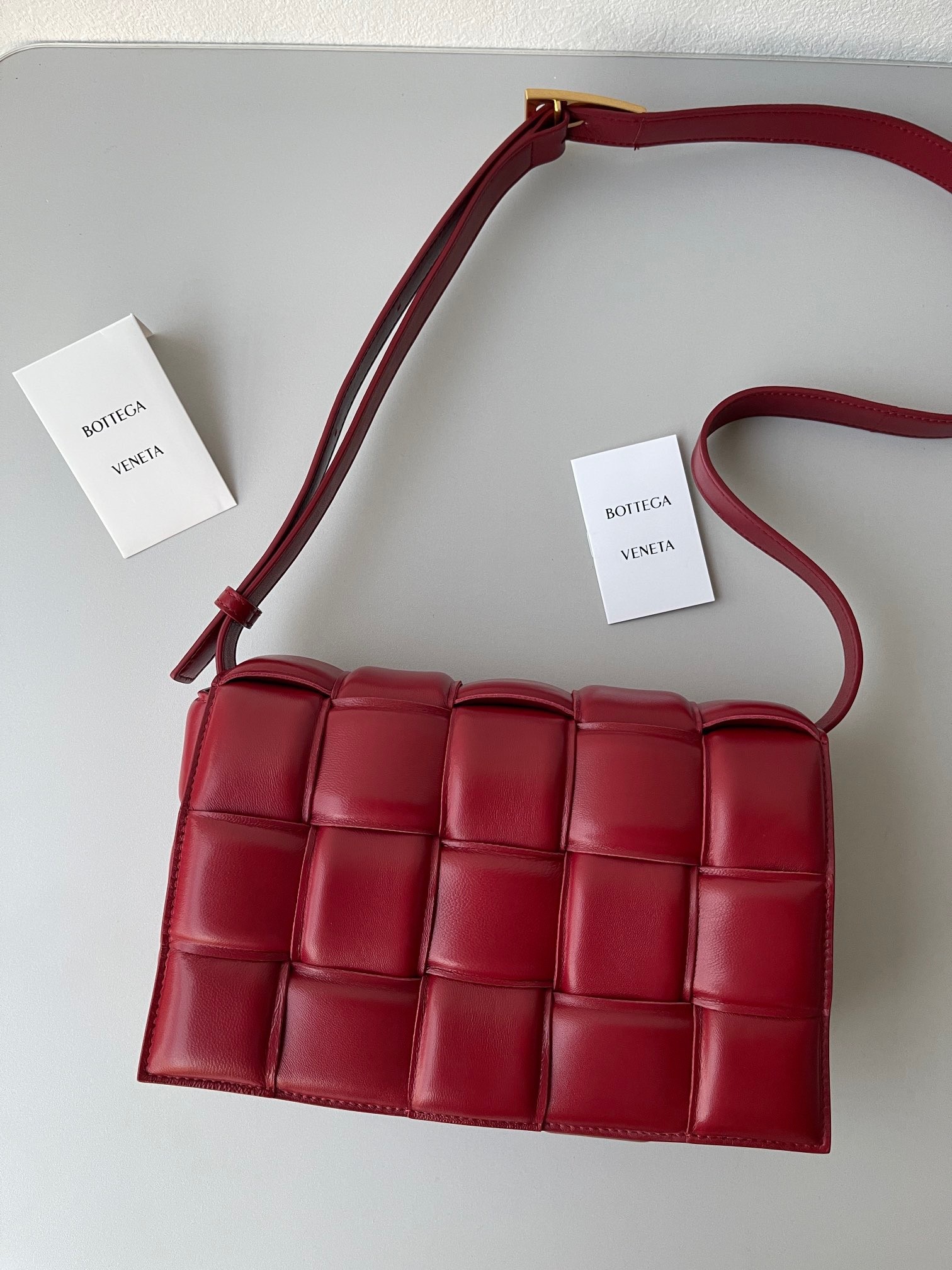 Bottega Veneta Padded Cassette Bag In Dard Red Lambskin