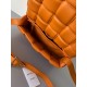 Bottega Veneta Padded Cassette Bag In Orange Lambskin