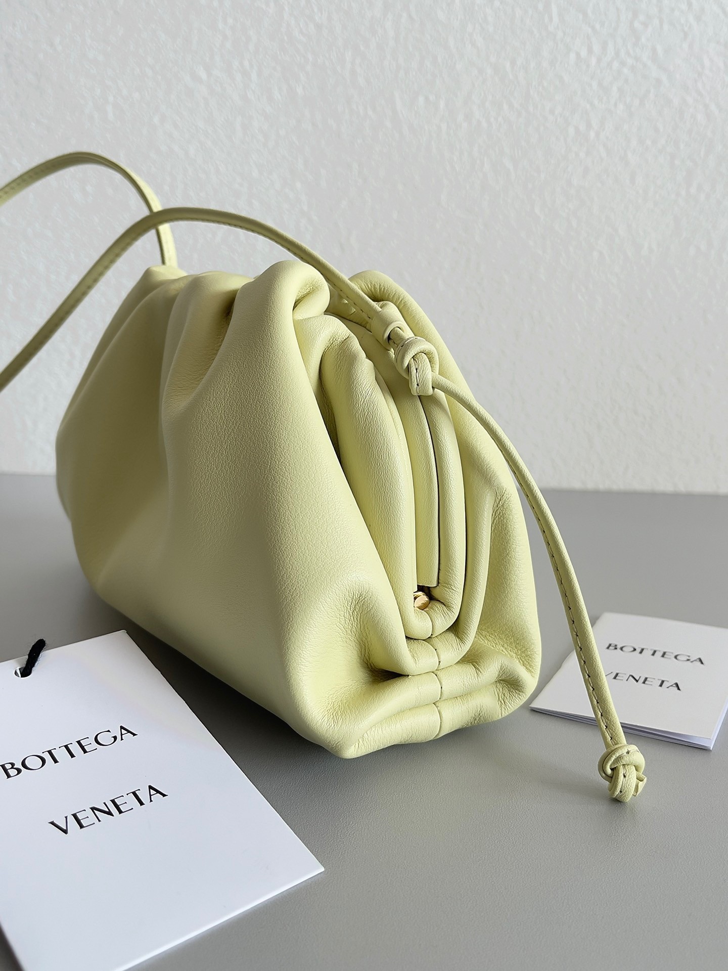 Bottega Veneta Mini Pouch Bag In Zest Washed Calfskin