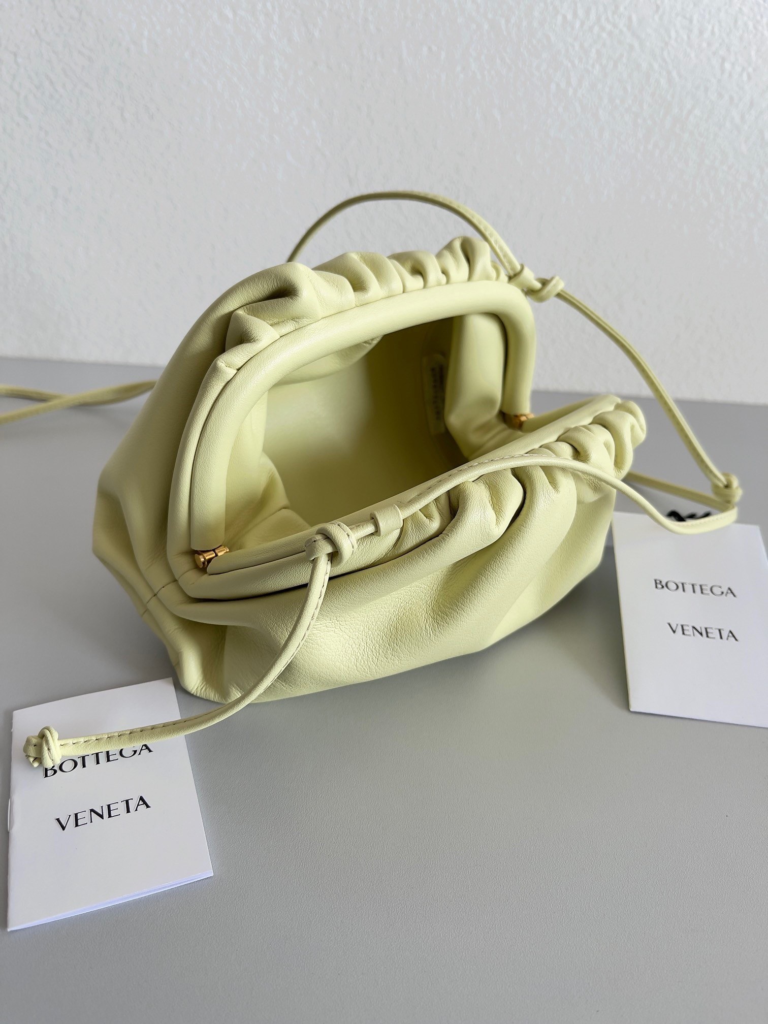 Bottega Veneta Mini Pouch Bag In Zest Washed Calfskin