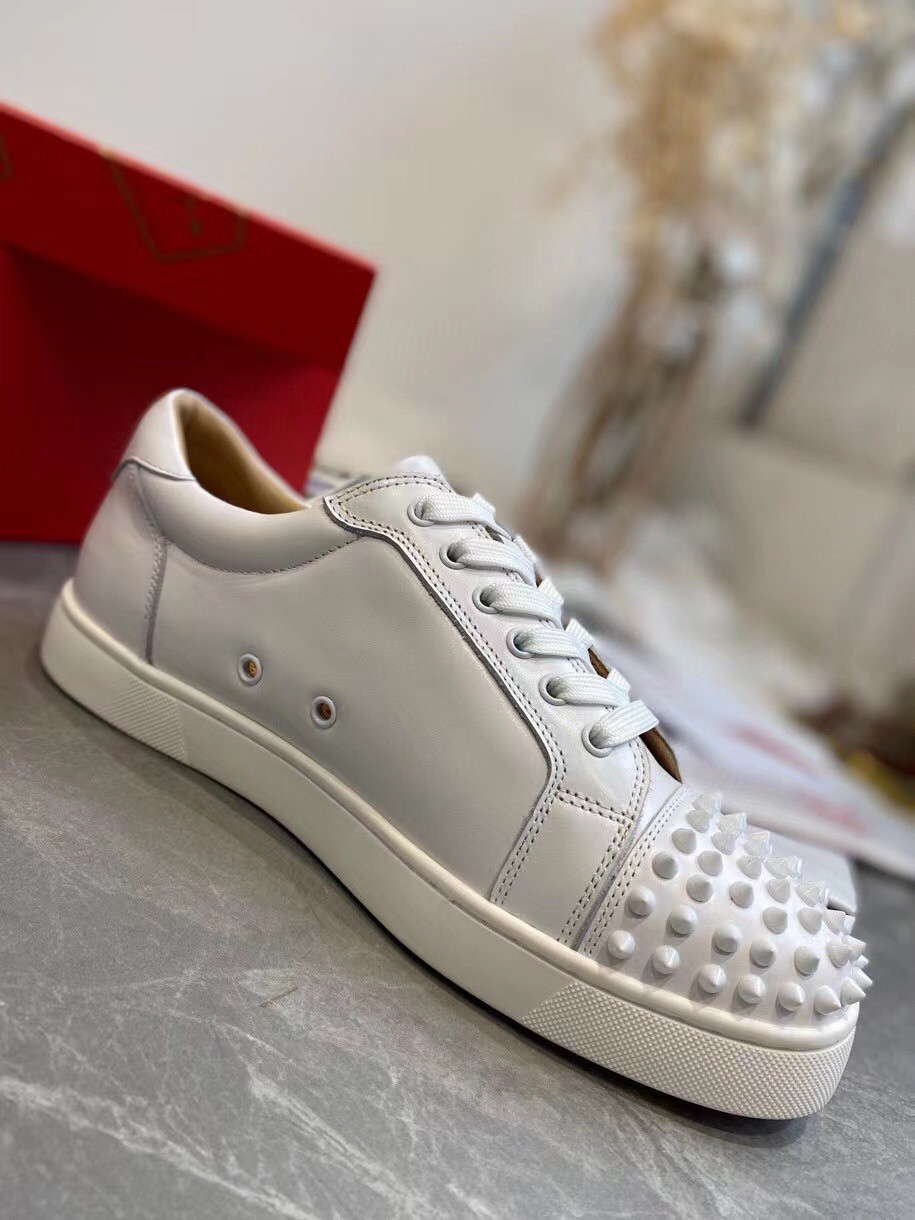 Christian Louboutin Men's Louis Junior Spikes Flat Sneakers In White Leather