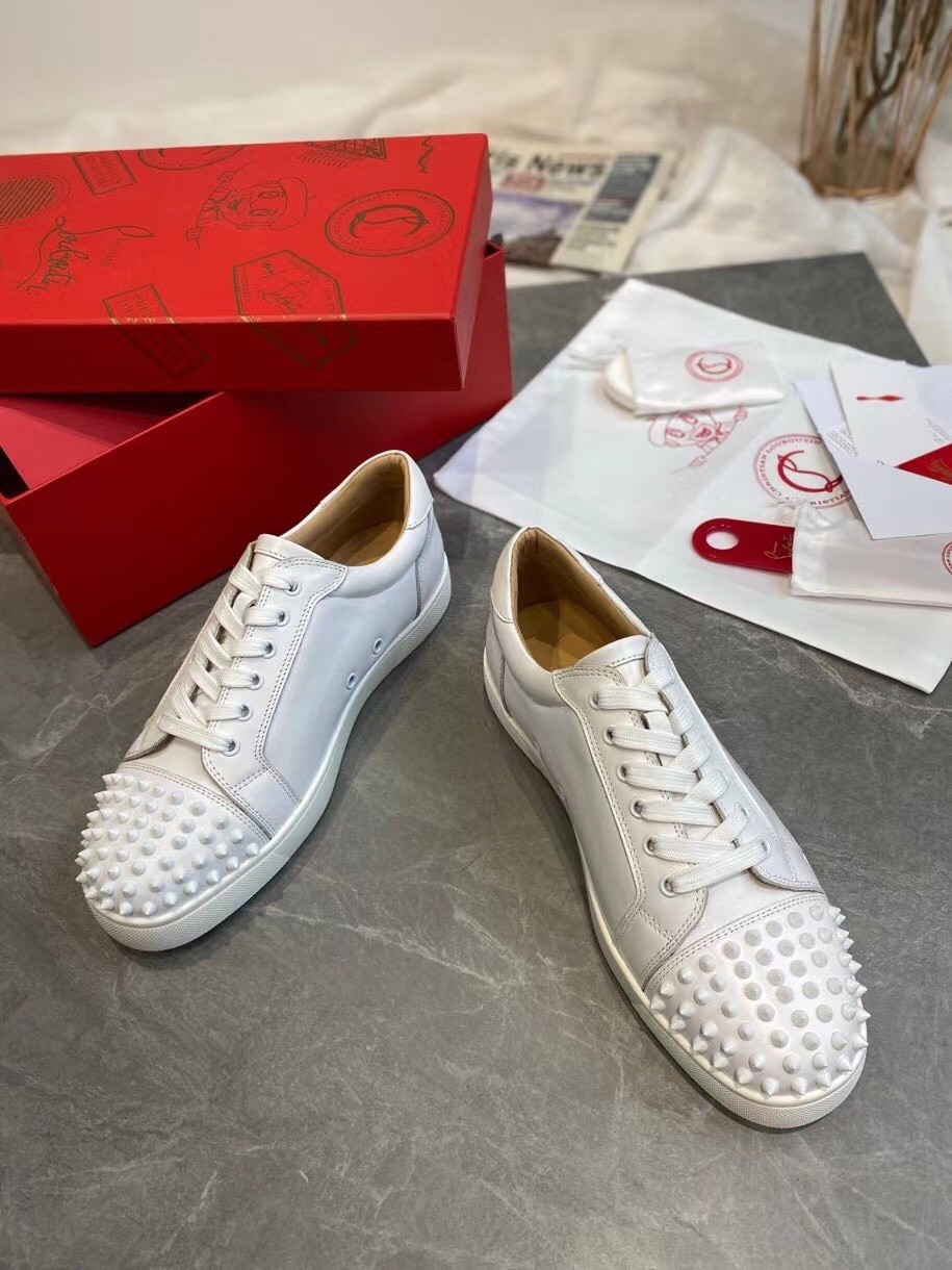 Christian Louboutin Men's Louis Junior Spikes Flat Sneakers In White Leather