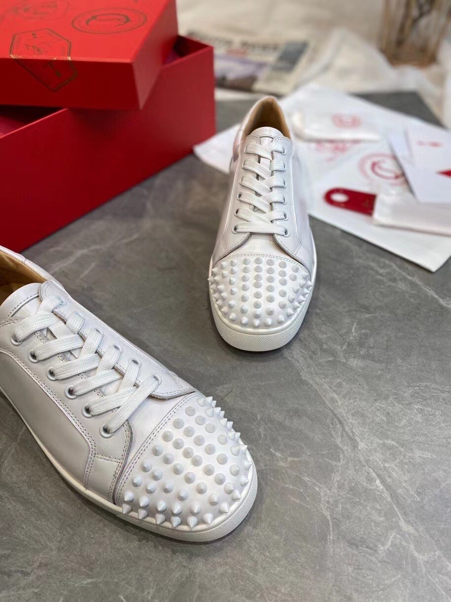 Christian Louboutin Men's Louis Junior Spikes Flat Sneakers In White Leather