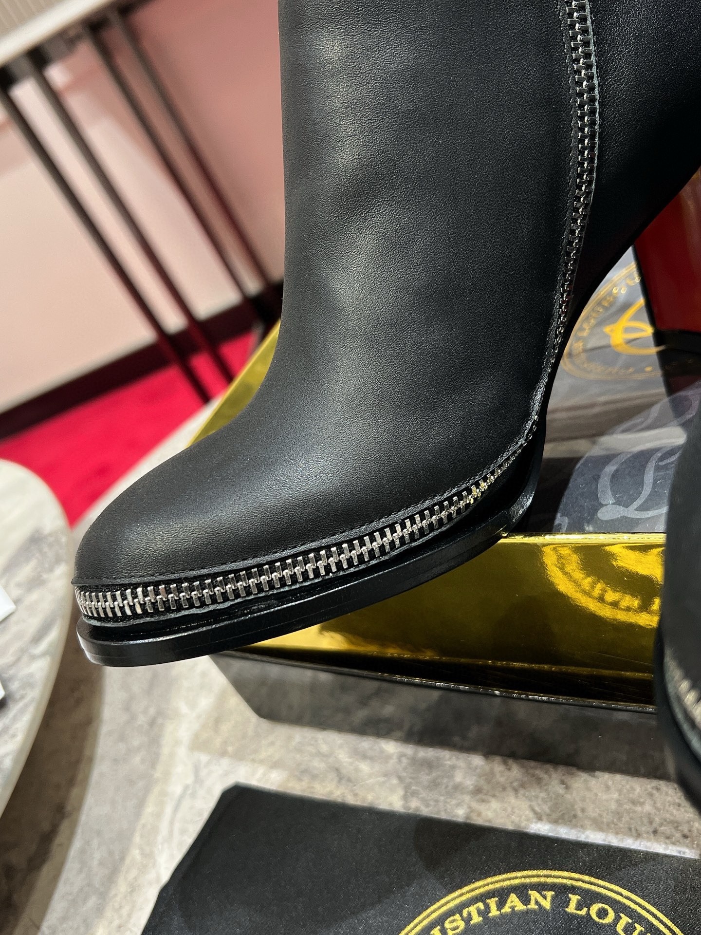 Christian Louboutin CL Zip Booty 70mm in Black Leather