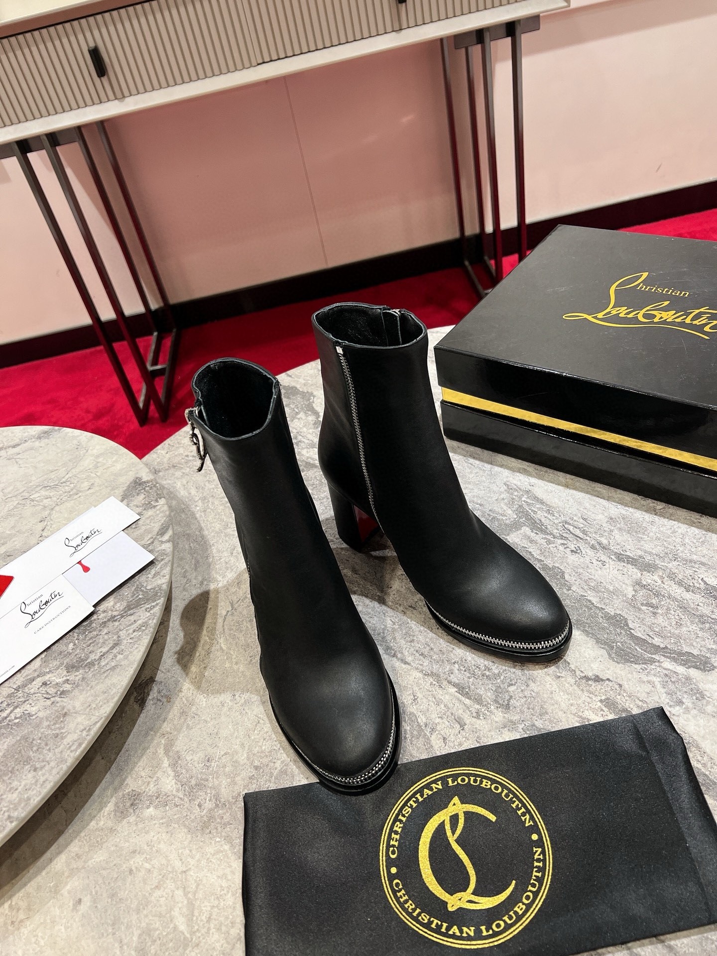 Christian Louboutin CL Zip Booty 70mm in Black Leather