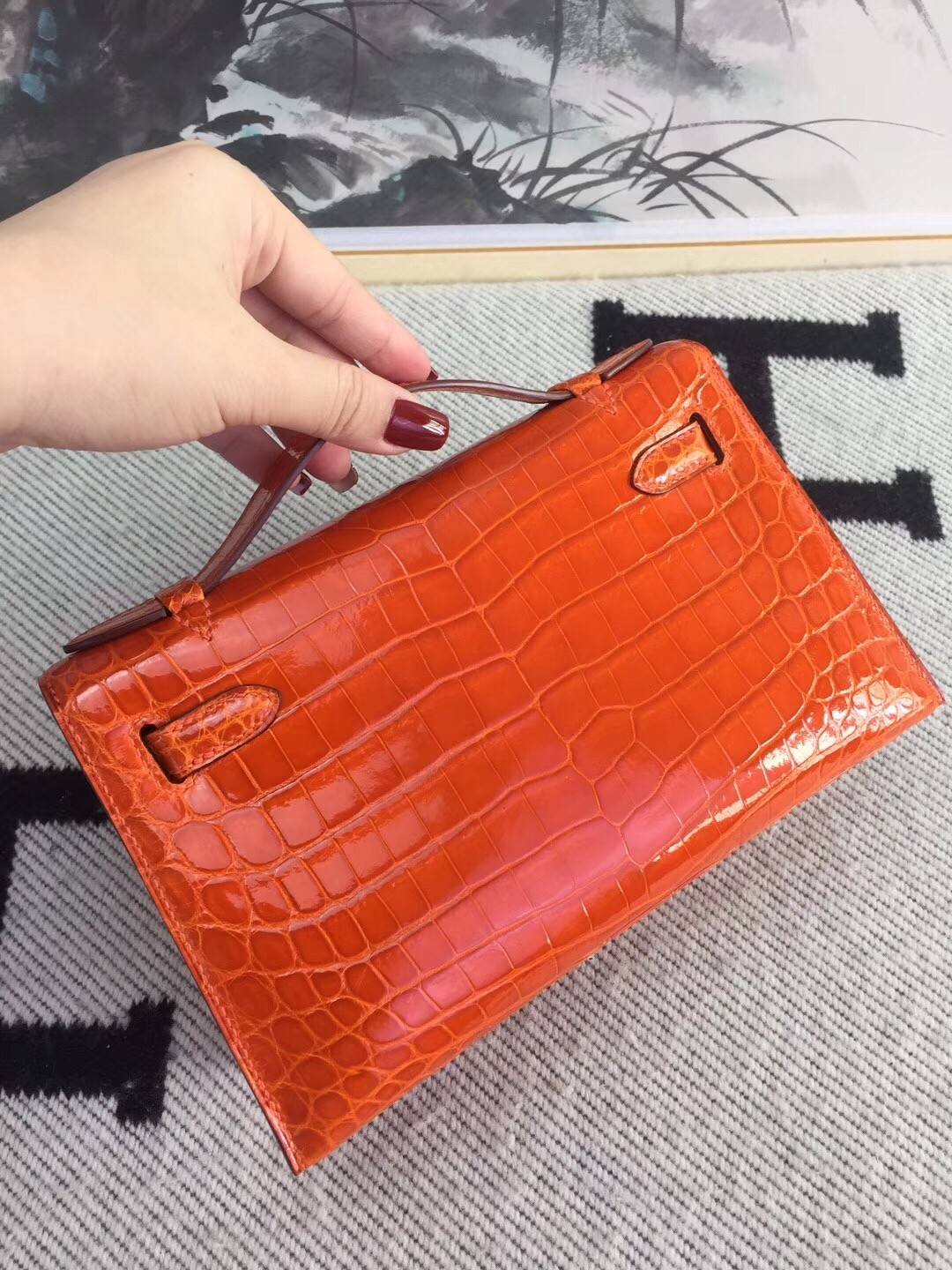 Hermes Orange Kelly Pochette Shiny Niloticus Crocodile Bag