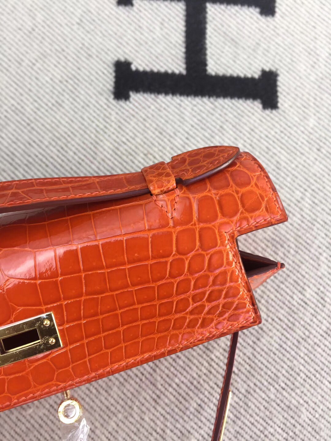 Hermes Orange Kelly Pochette Shiny Niloticus Crocodile Bag