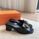 Hermes Women's Ilot 50 Sandals in Black Leather