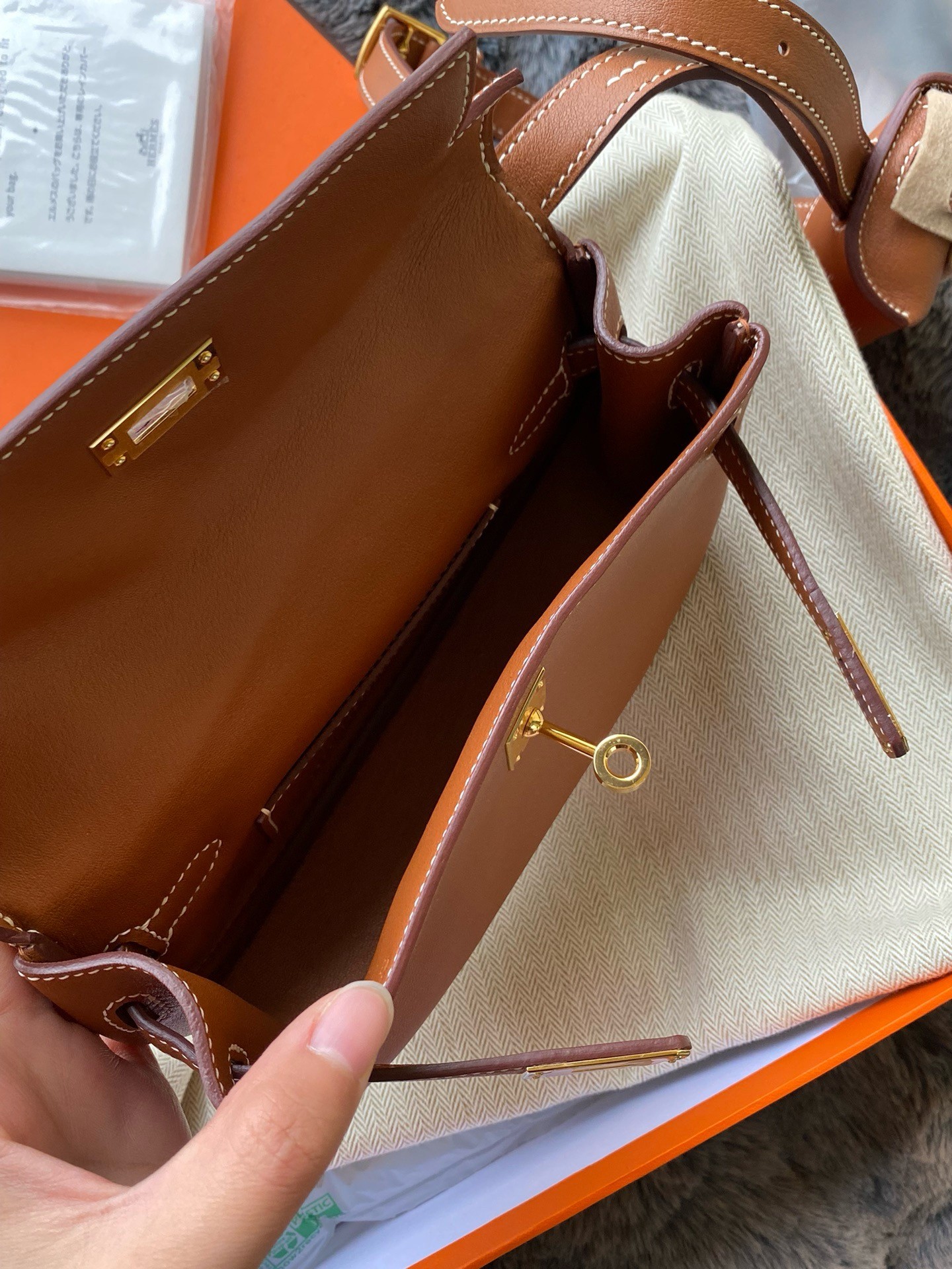 Hermès Kelly Moove Handmade Bag in Gold Swift Calfskin