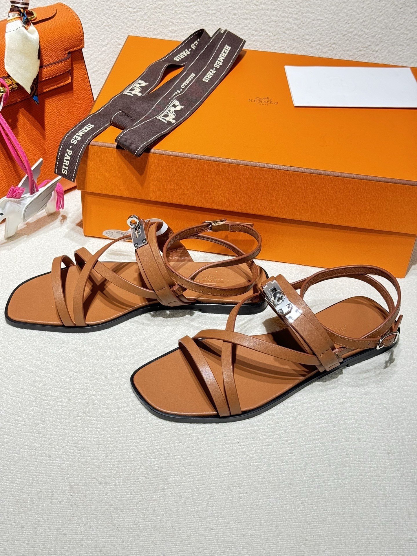 Hermes June Sandals in Brown Leather