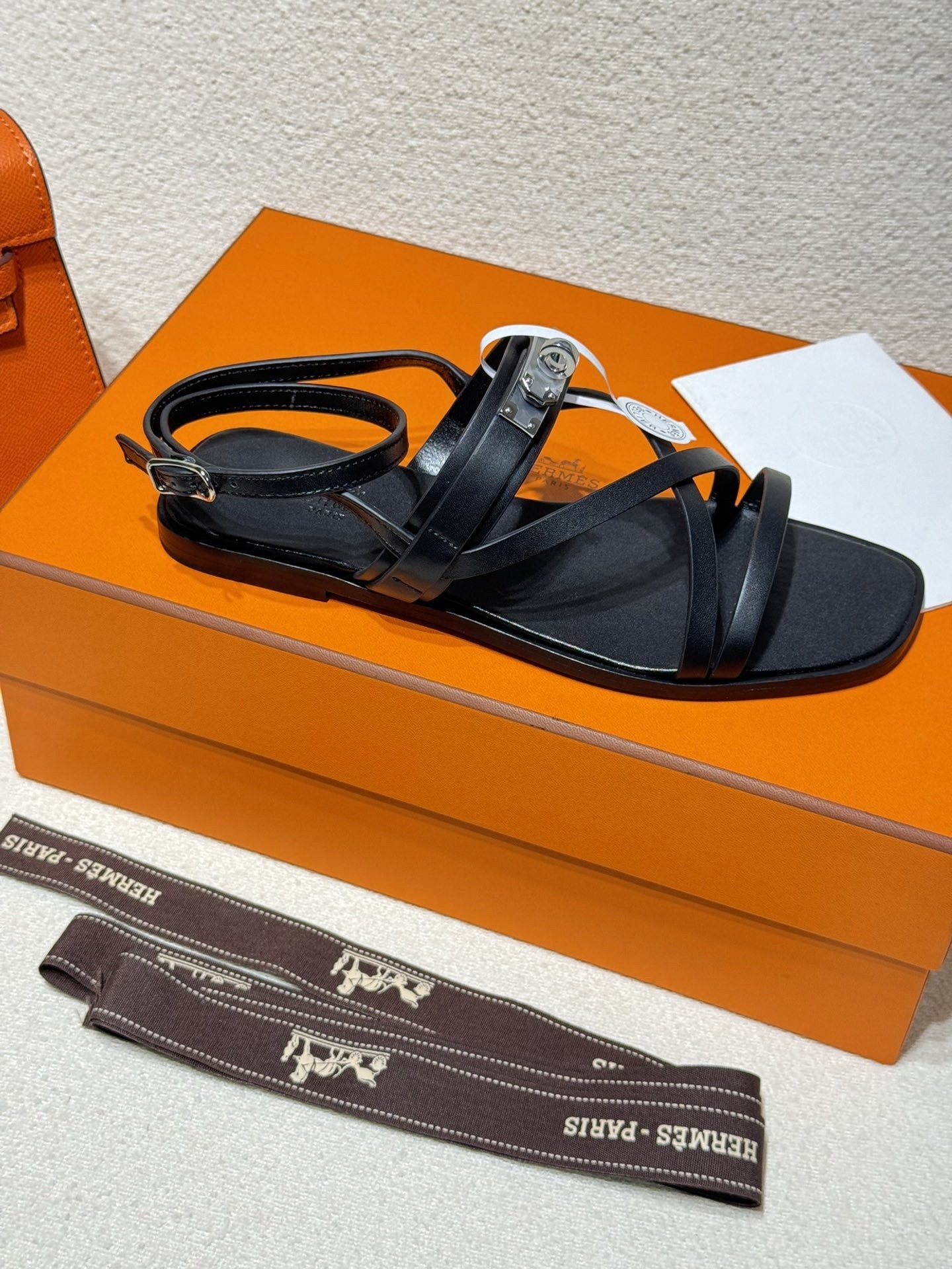 Hermes June Sandals in Black Leather