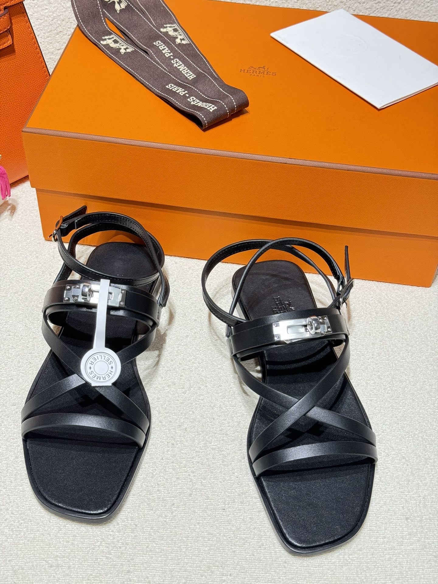 Hermes June Sandals in Black Leather