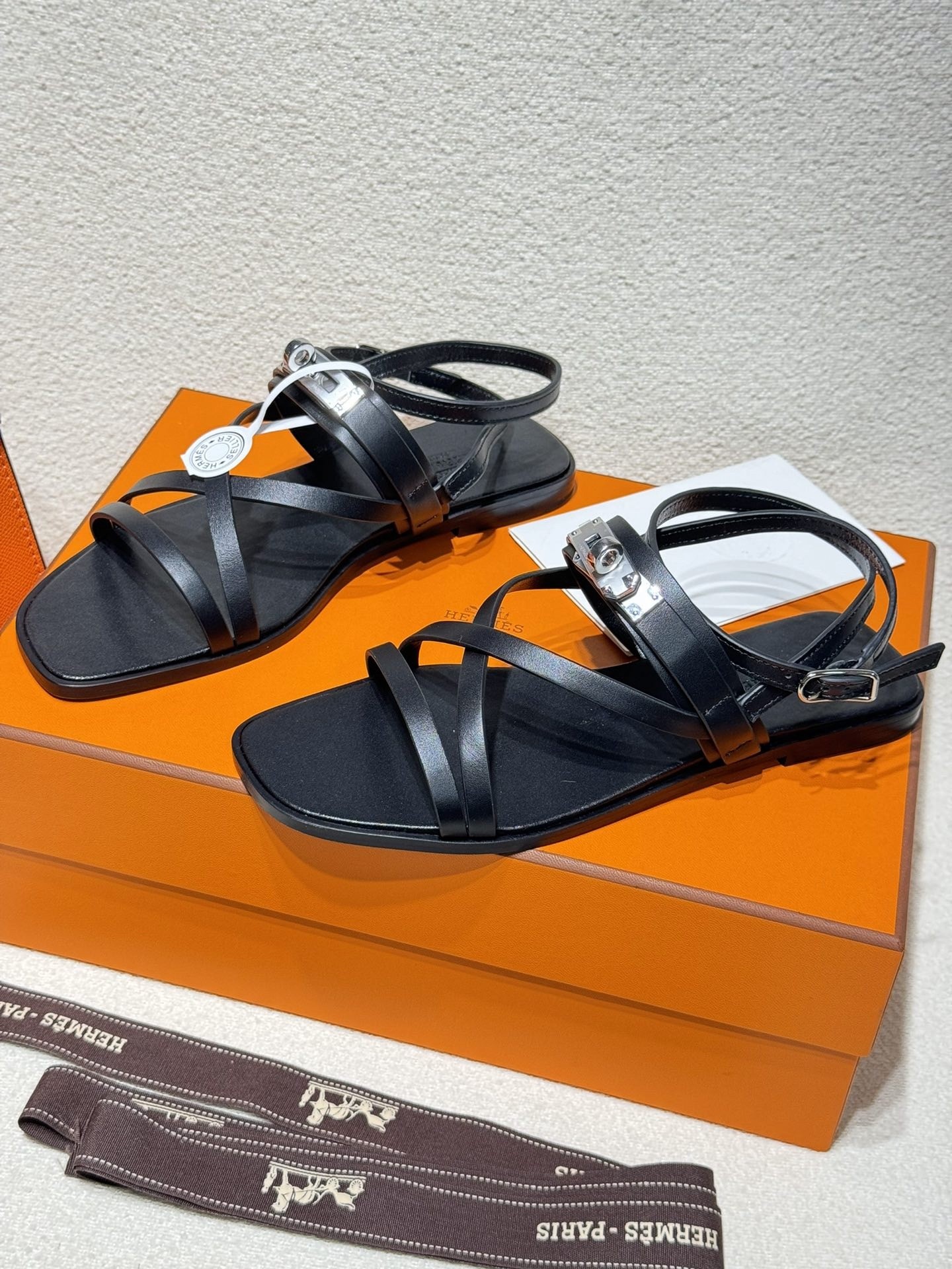 Hermes June Sandals in Black Leather