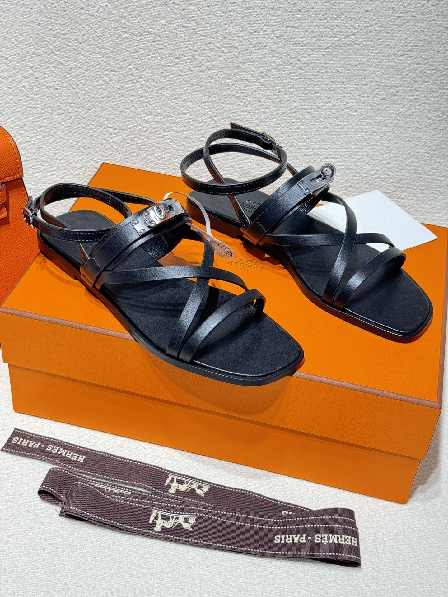 Hermes June Sandals in Black Leather