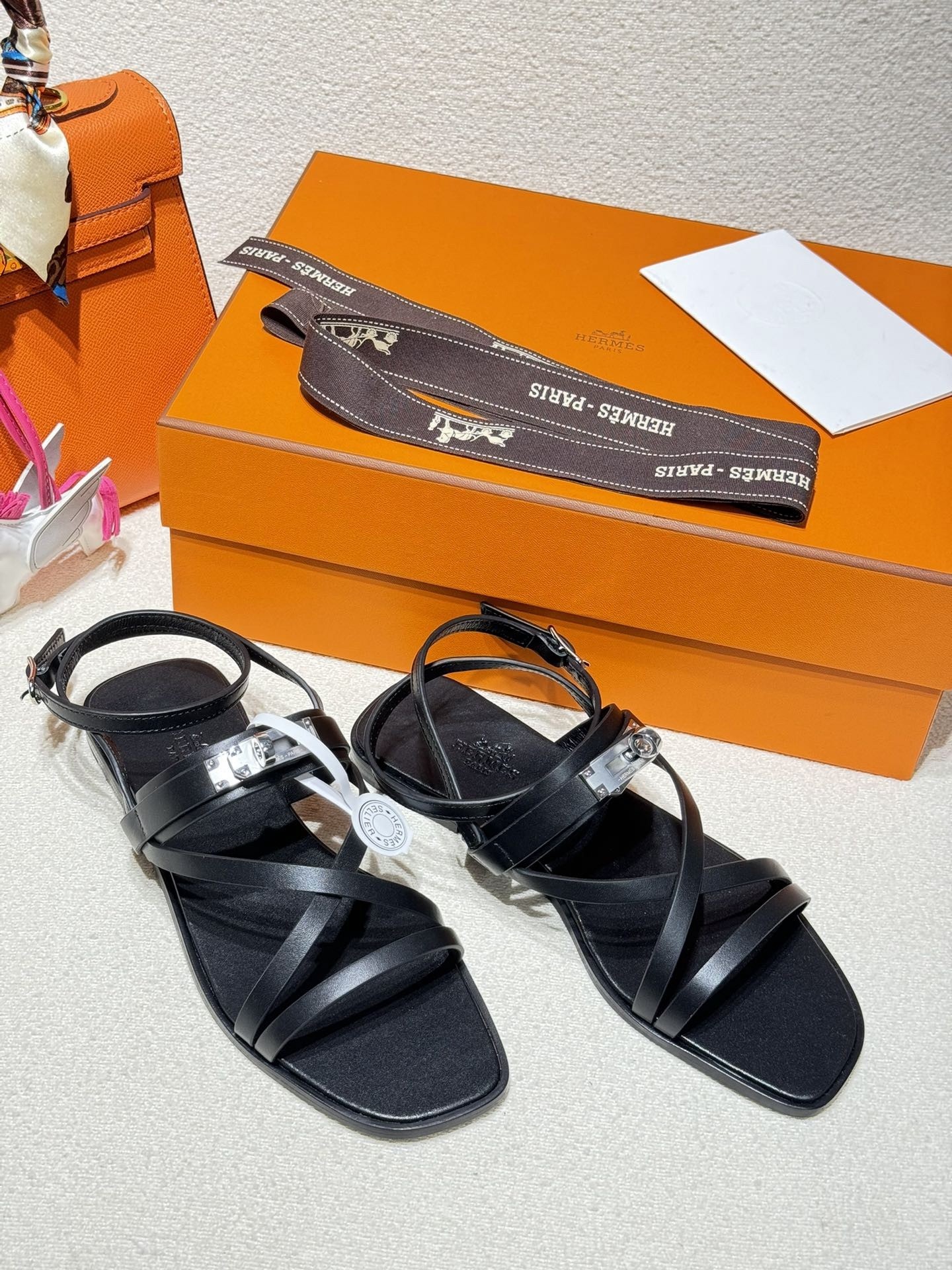 Hermes June Sandals in Black Leather