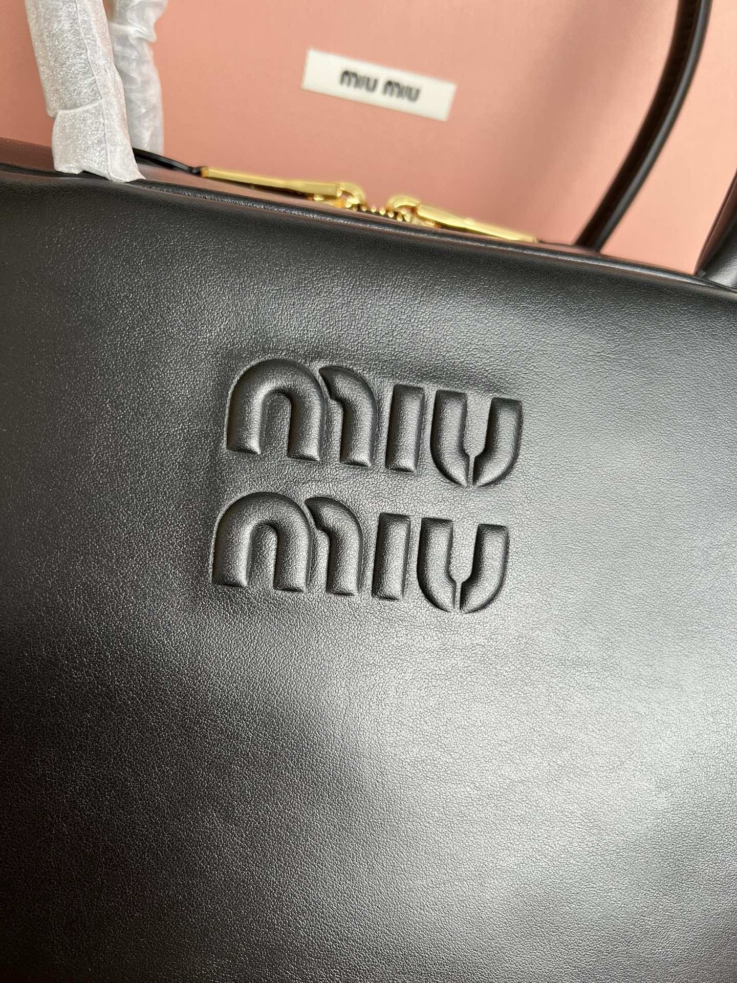 Miu Miu Beau Top-handle Bag in Black Leather