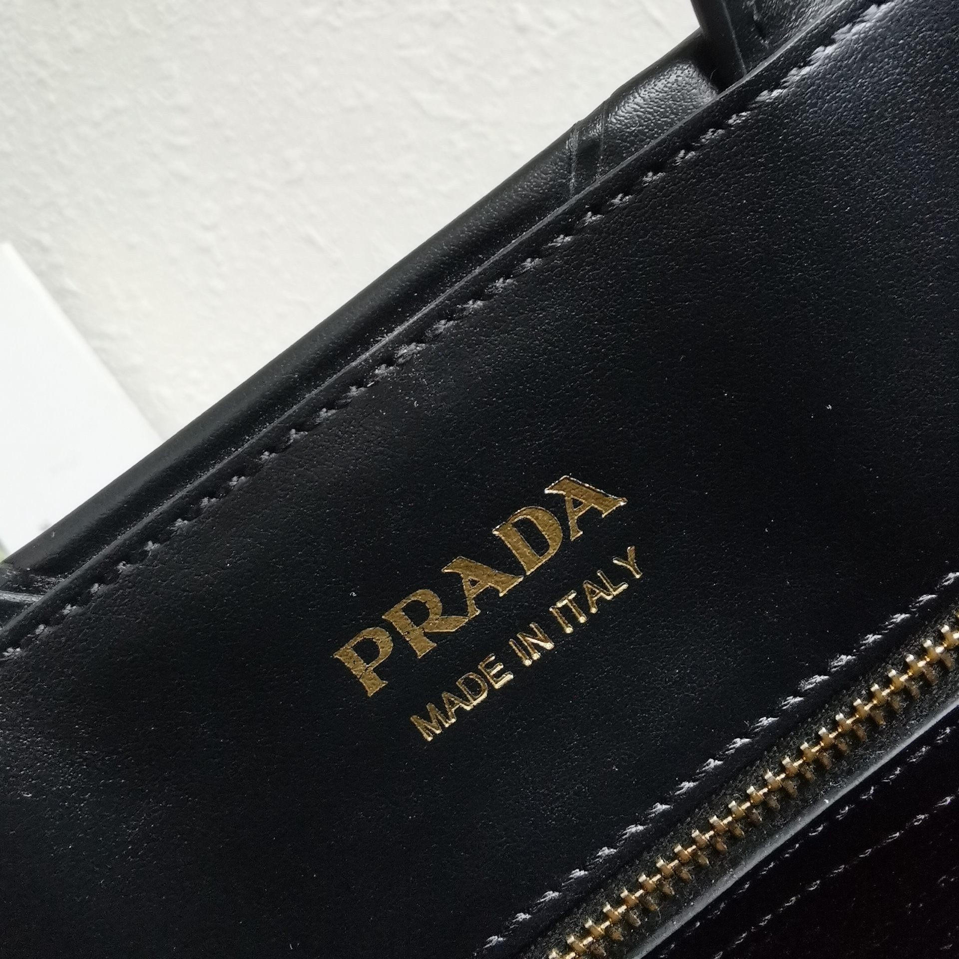 Prada Symbole Medium Bag with Topstitching in Black Leather