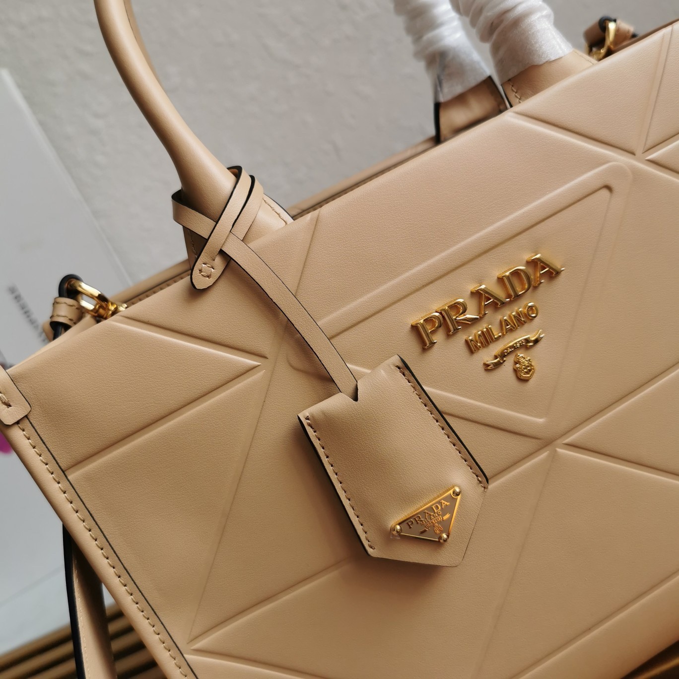 Prada Symbole Small Bag with Topstitching in Beige Leather