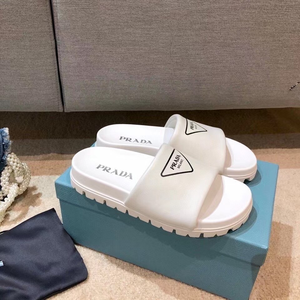 Prada Slide Sandals In White Leather