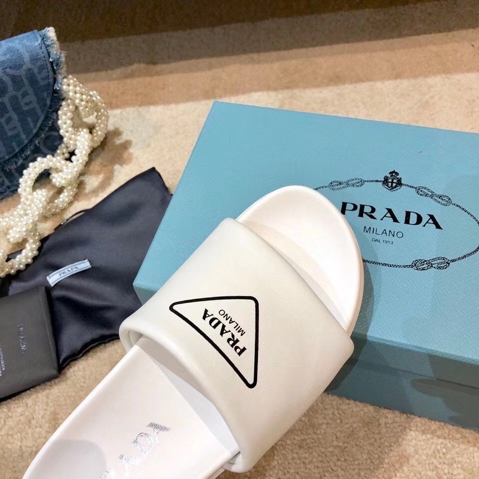 Prada Slide Sandals In White Leather