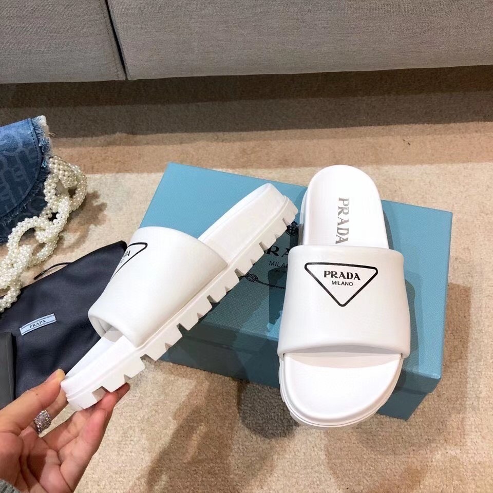 Prada Slide Sandals In White Leather