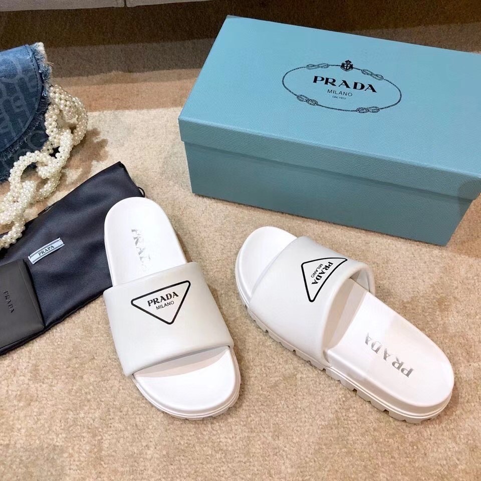 Prada Slide Sandals In White Leather