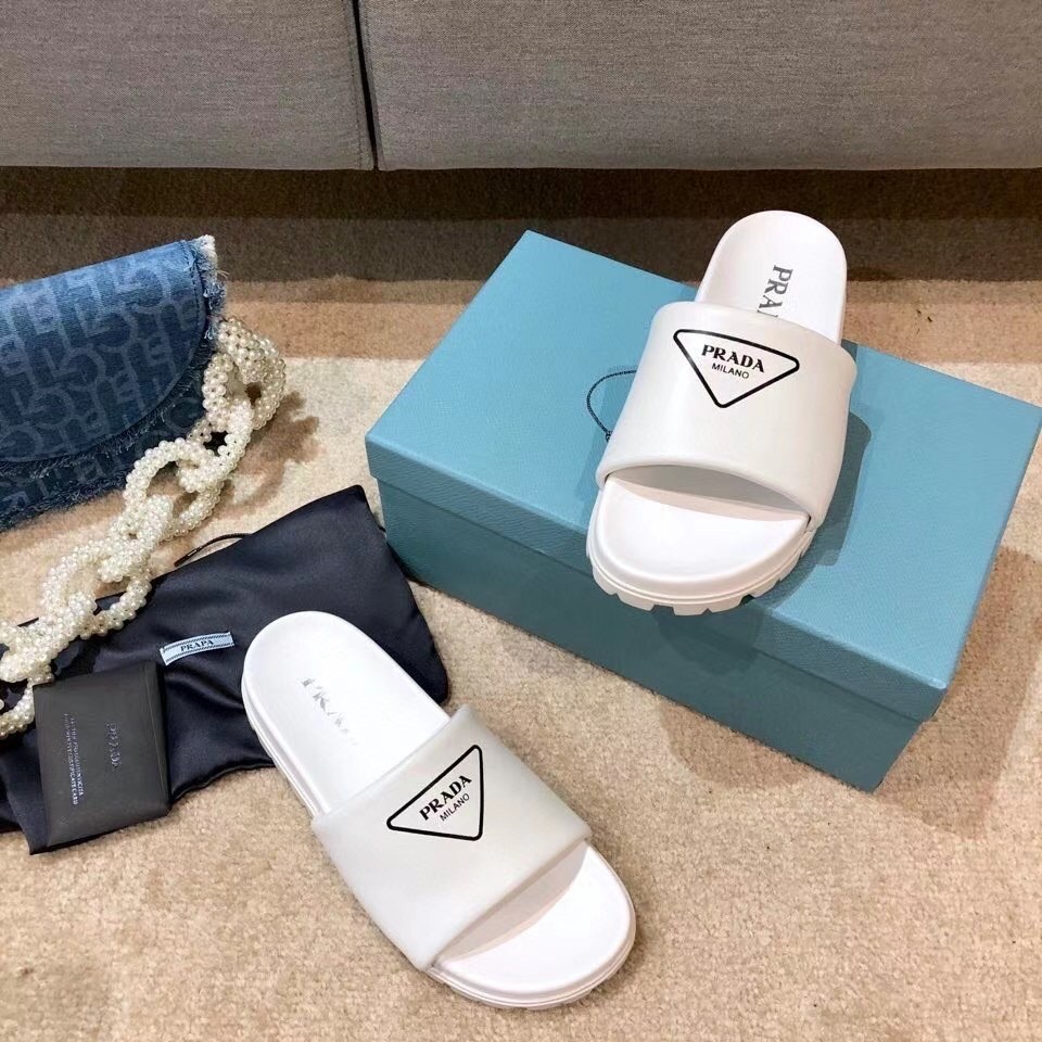 Prada White Leather Slides with Printed Triangle Logo