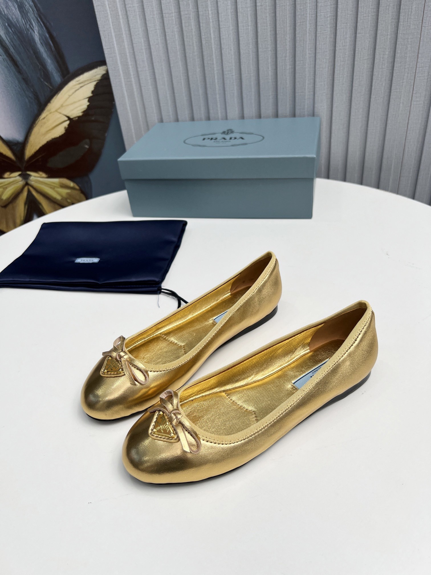 Prada Ballerinas in Gold Nappa Leather