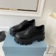 Prada Monolith Lace-up Loafers in Black Brushed Leather