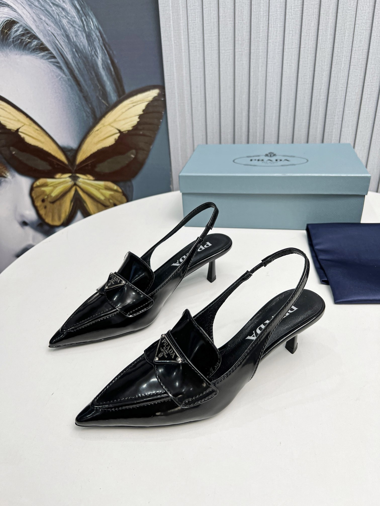 Prada Slingback Pumps 45mm in Black Patent Calfskin