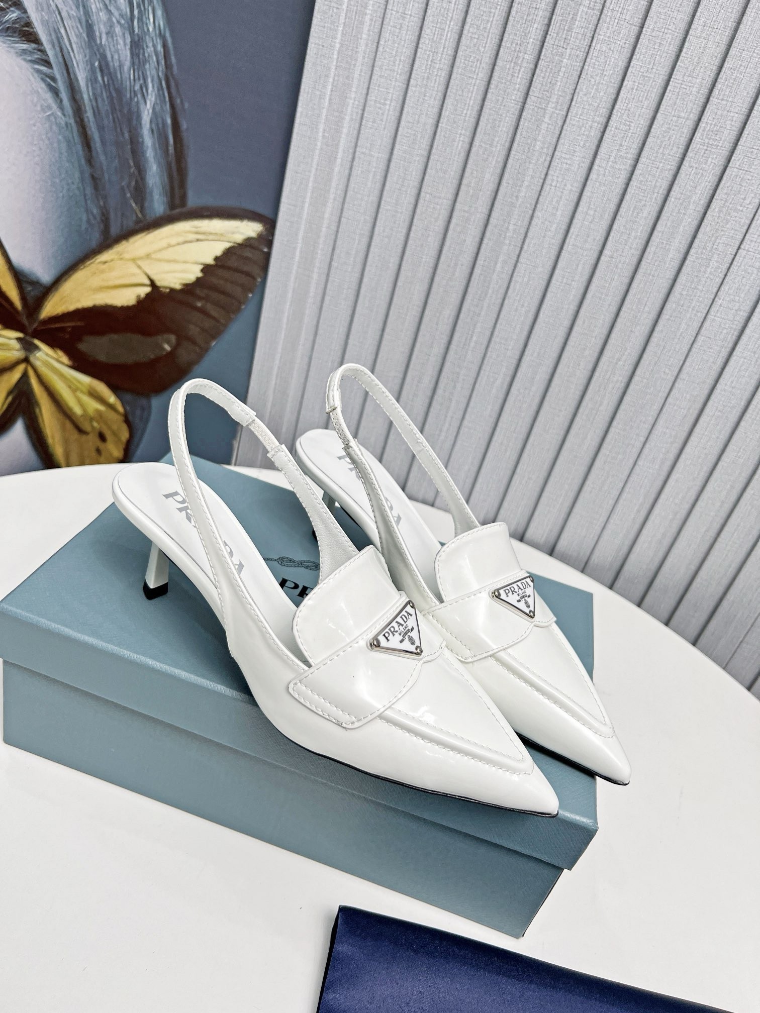 Prada Slingback Pumps 45mm in White Patent Calfskin