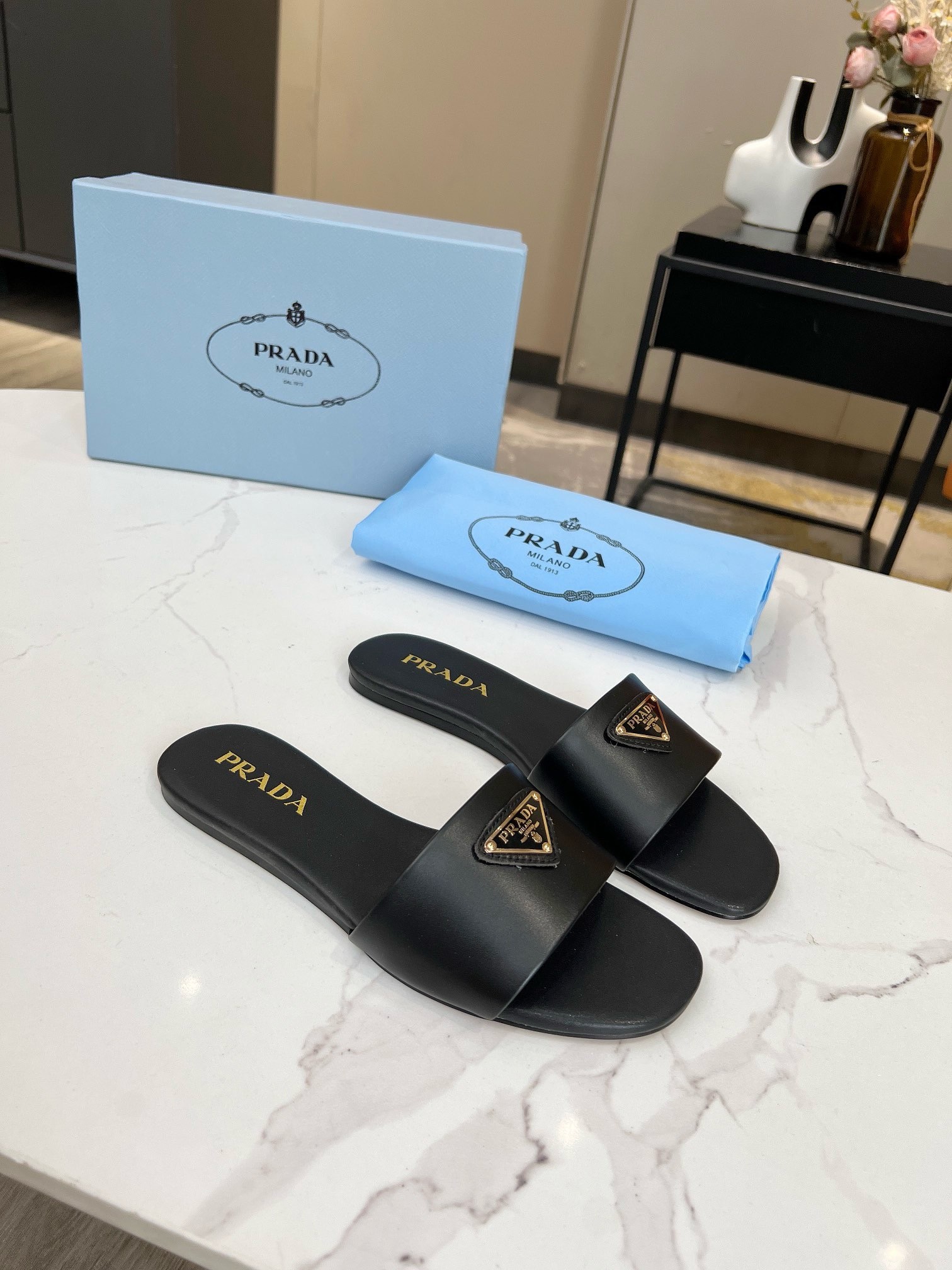 Prada Women's Slides in Black Smooth Leather