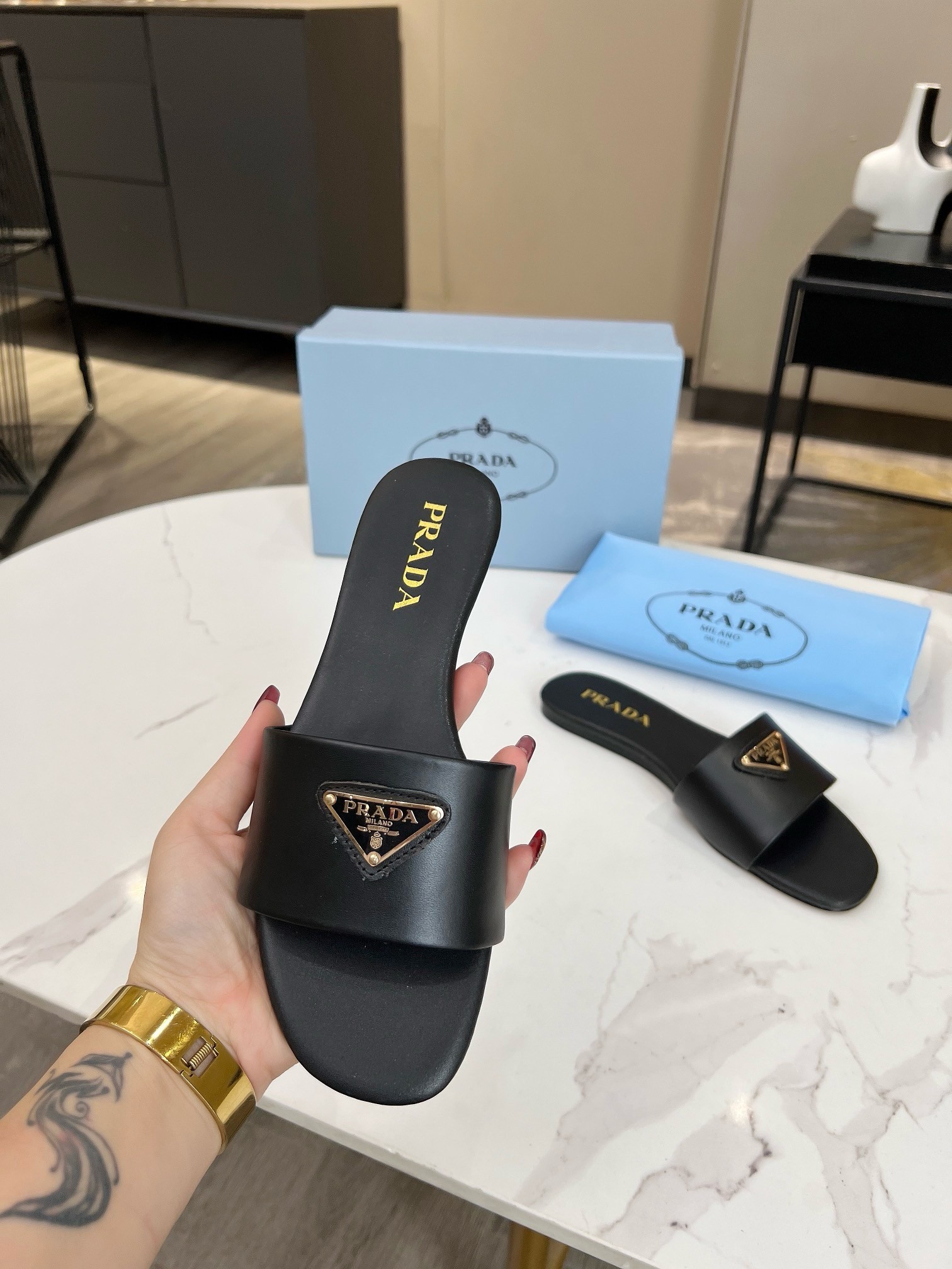 Prada Women's Slides in Black Smooth Leather