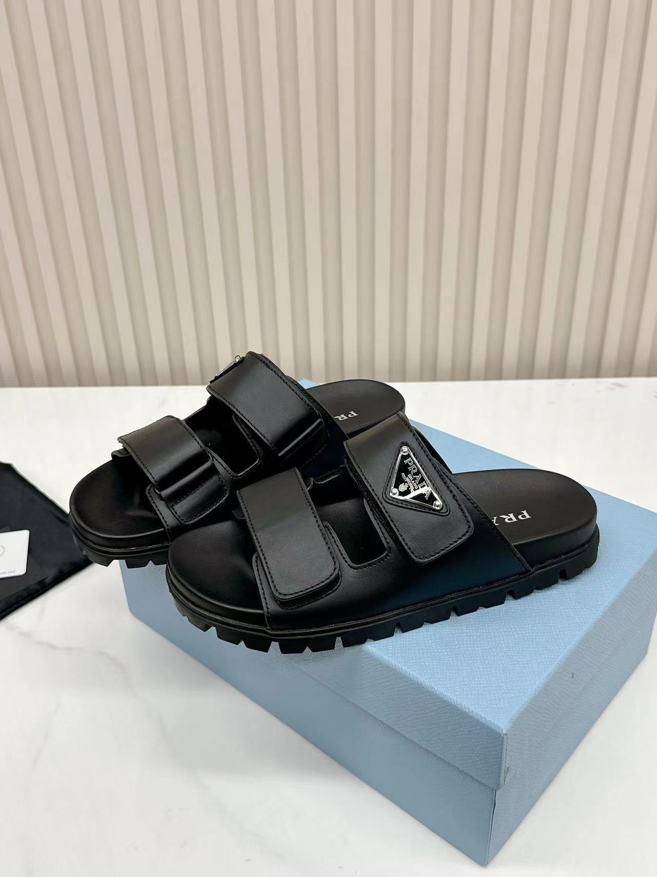 Prada Women's Strap Slides Sandals in Black Calfskin