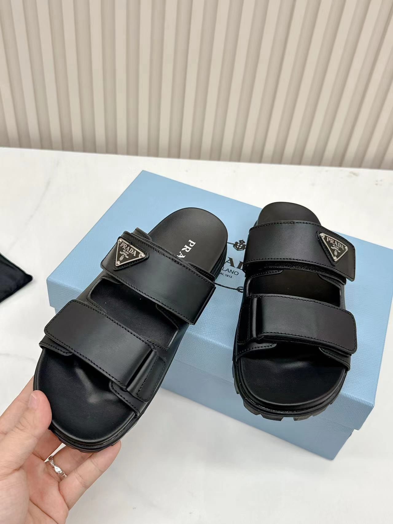 Prada Women's Strap Slides Sandals in Black Calfskin