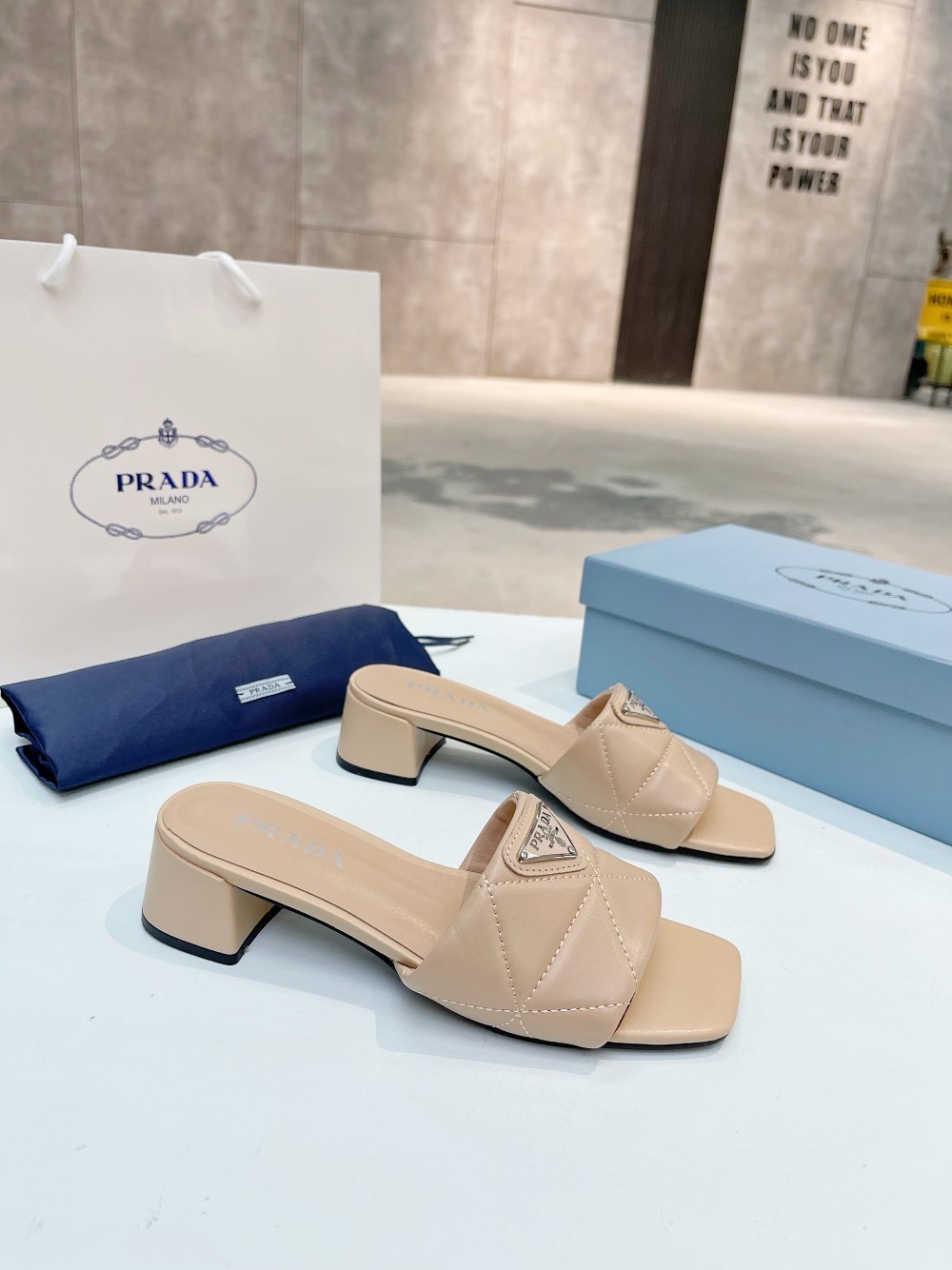 Prada Women's Slides Sandals 35mm in Beige Nappa Leather