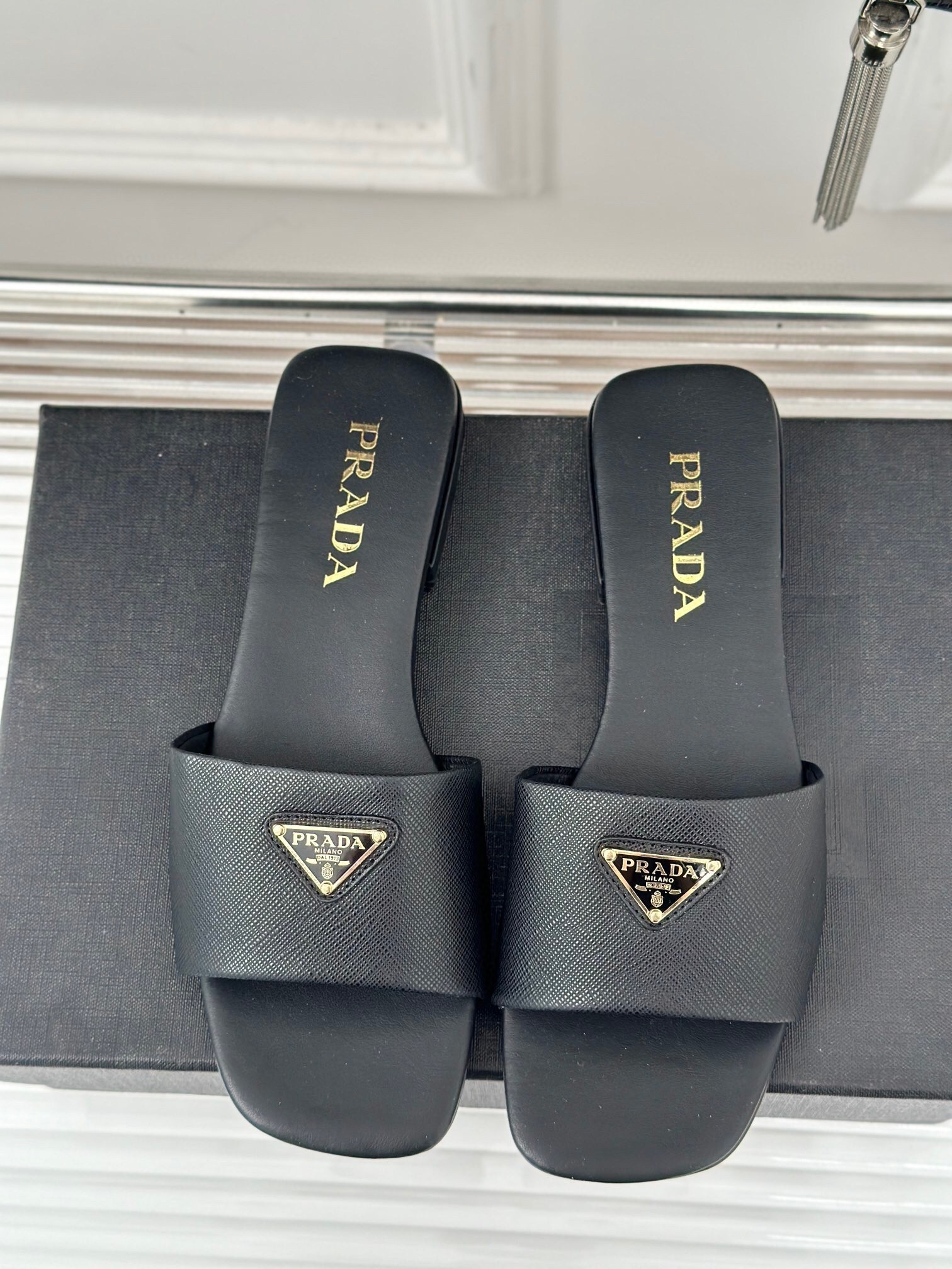 Prada Women's Slides in Black Saffiano Leather