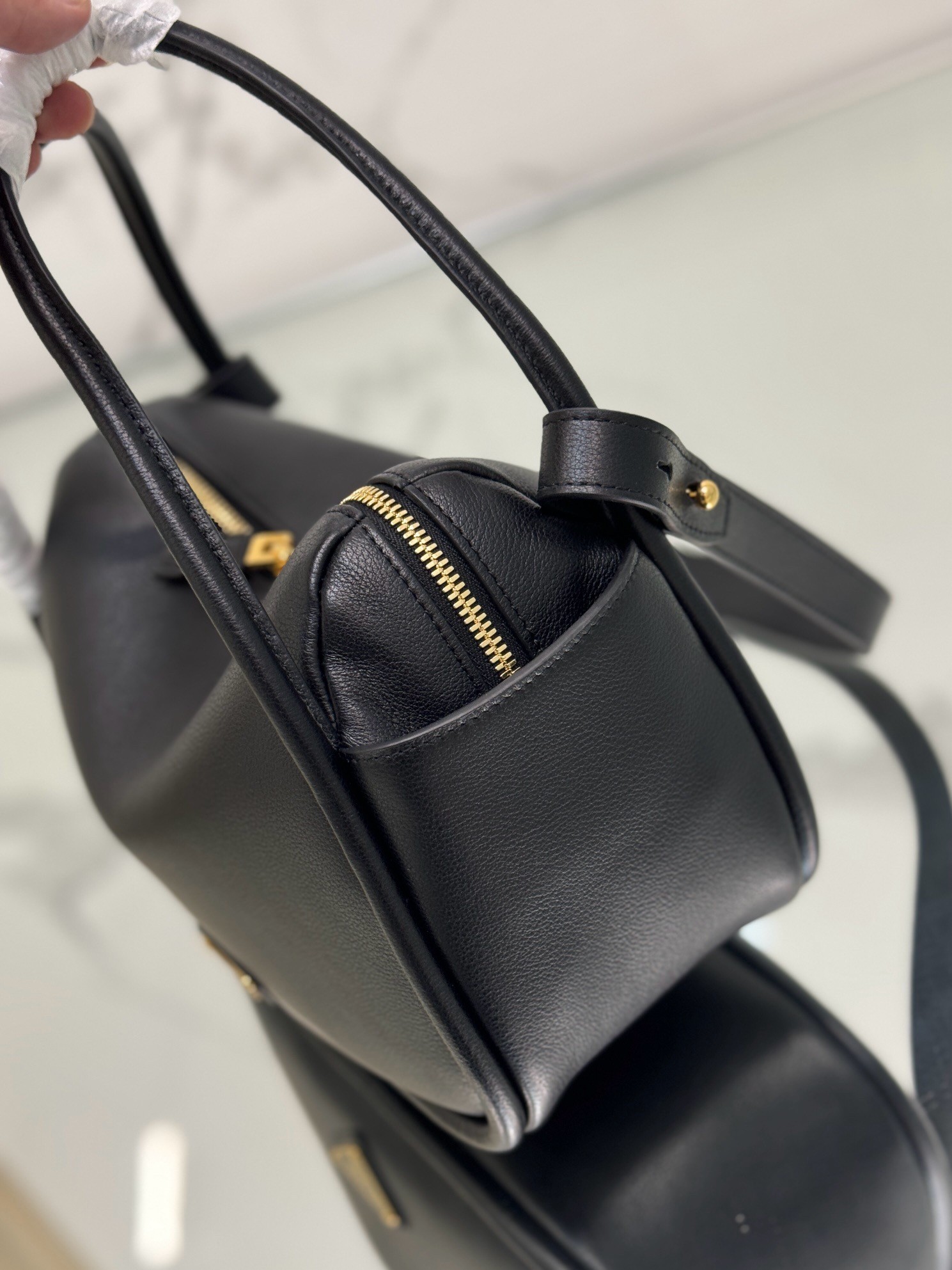 Prada Top Handle Bag in Black Grained Leather