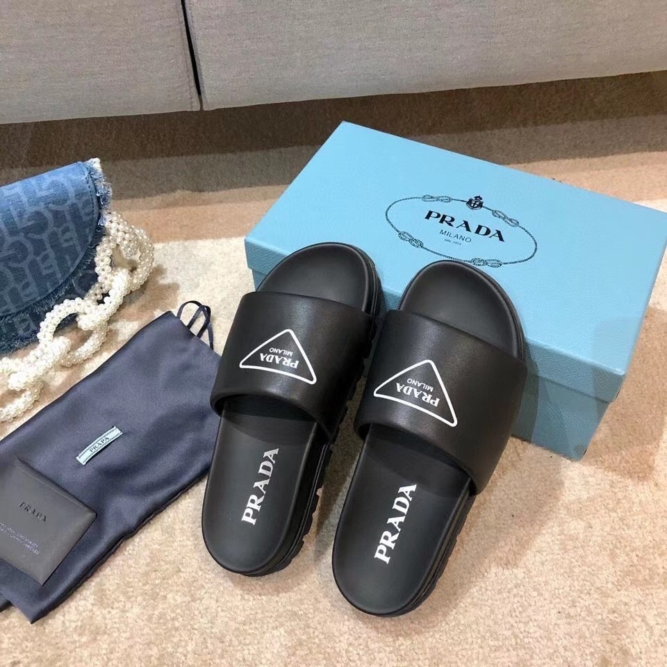 Prada Slide Sandals In Black Leather