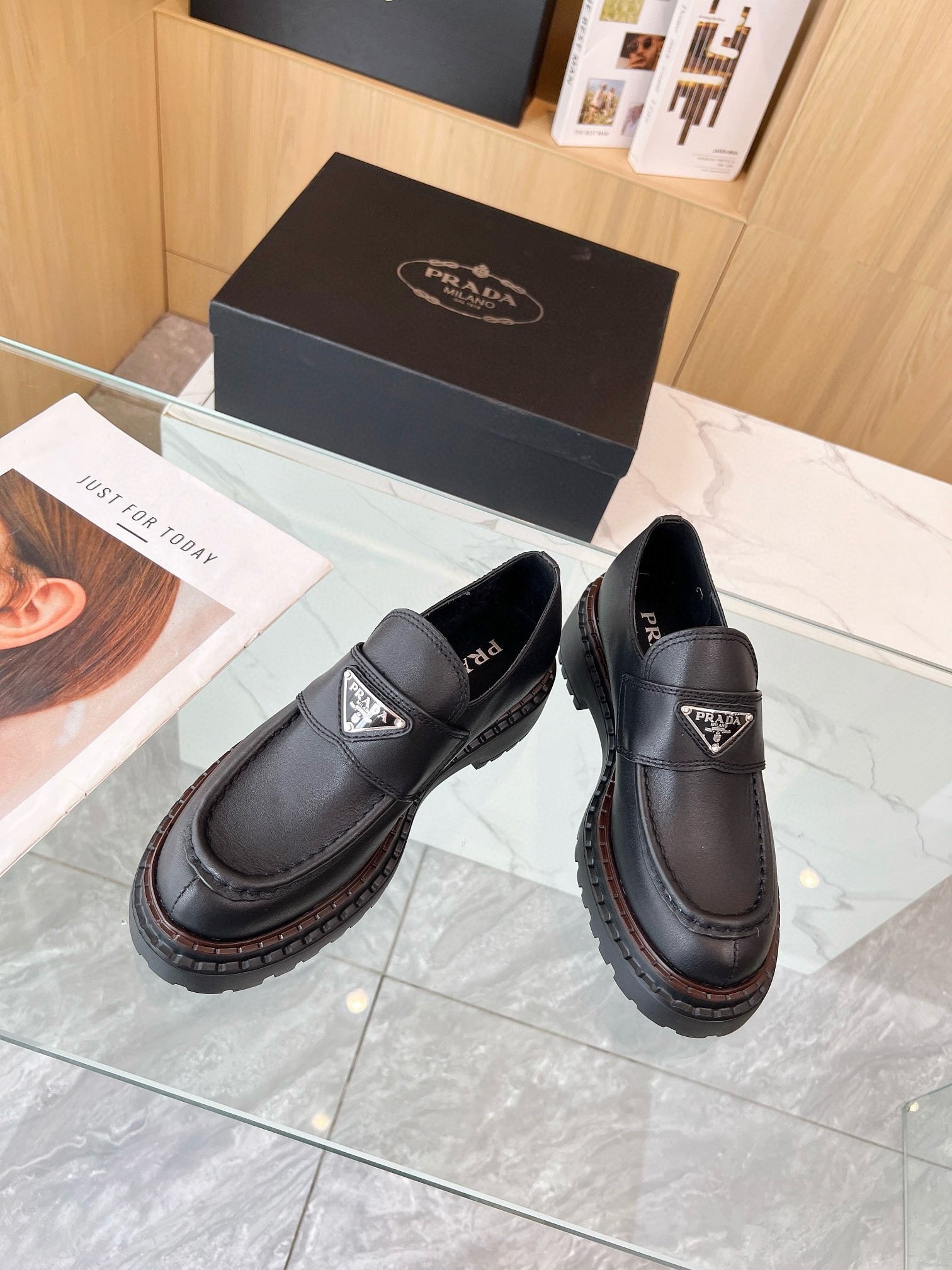 Prada Women's Double Chocolate Loafers in Black Leather