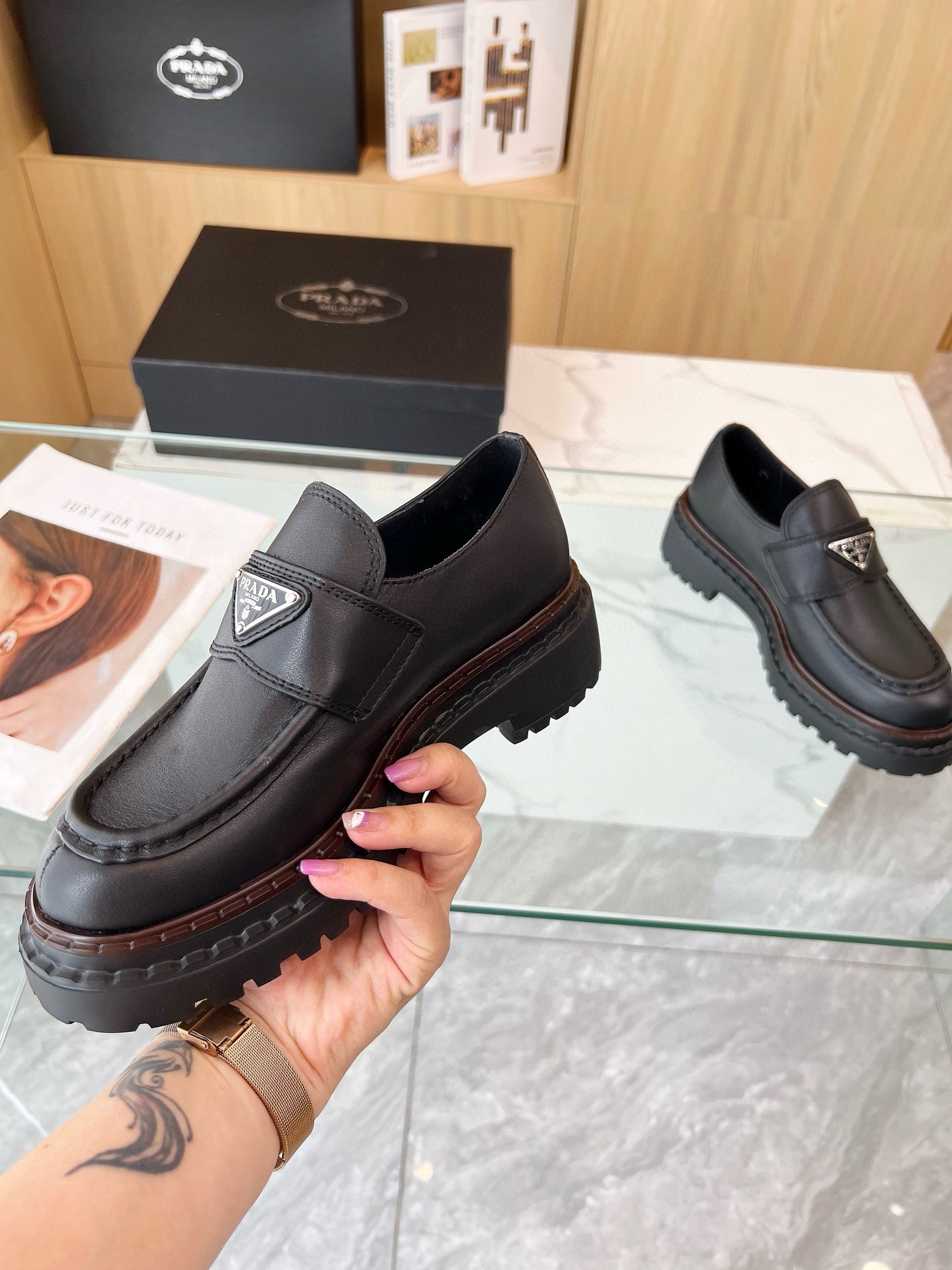 Prada Women's Double Chocolate Loafers in Black Leather