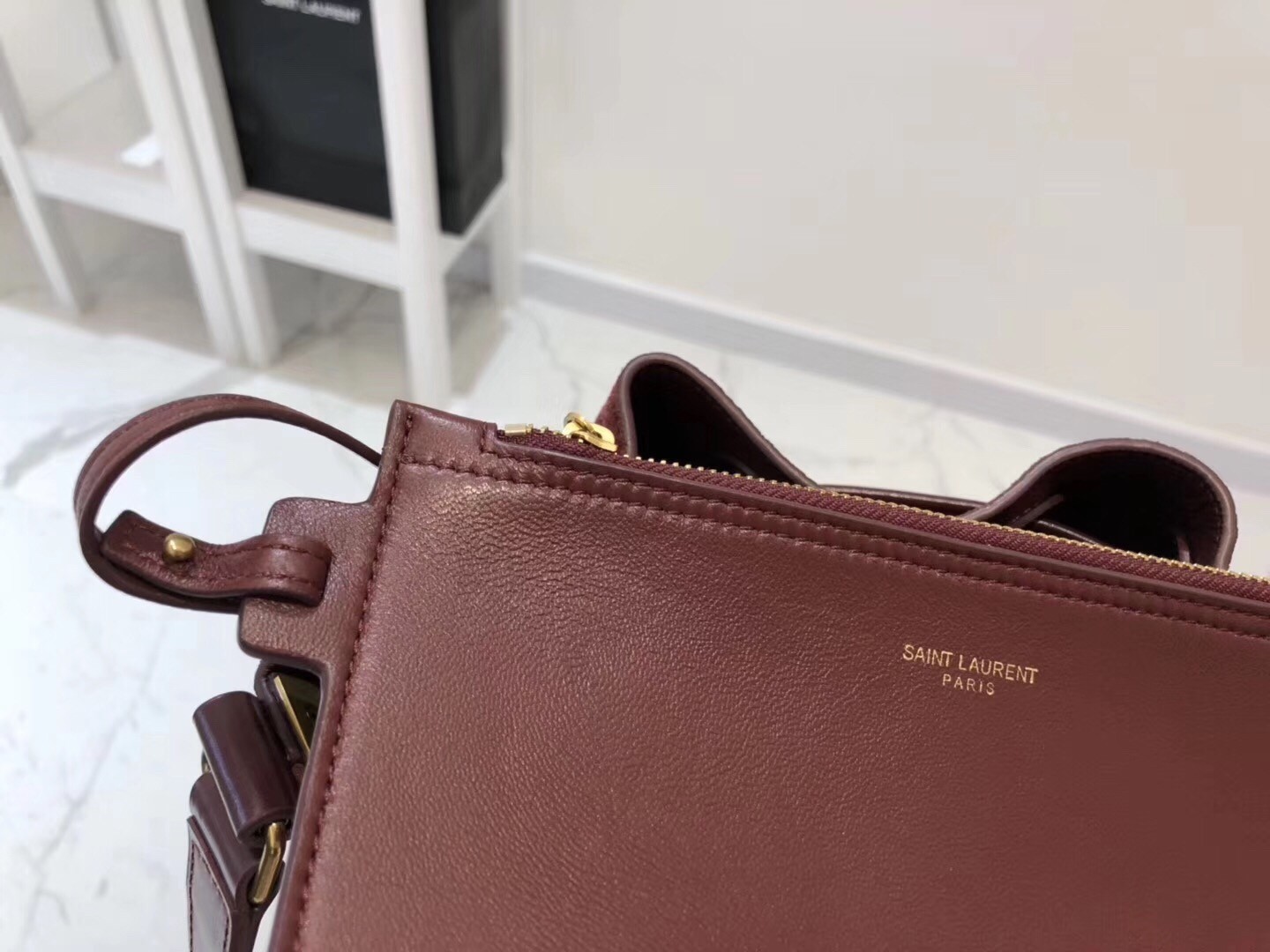 Saint Laurent Monogram All Over Bucket Bag In Bordeaux Suede