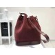 Saint Laurent Monogram All Over Bucket Bag In Bordeaux Suede