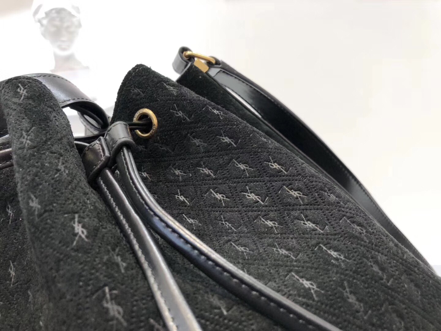 Saint Laurent Monogram All Over Bucket Bag In Black Suede